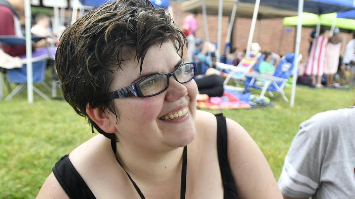 Katie Williams, of Clearfield, laughs with friends after competing in the 50-yard freestyle. The 2016 Special Olympics Pennsylvania Summer Games aquatic events were held at the McCoy Natatorium on the Penn State campus June 2, 2016.