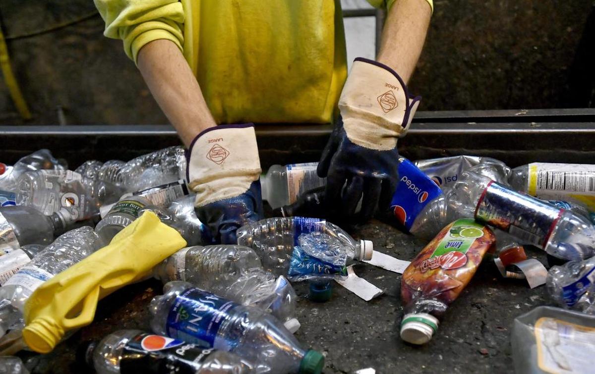 Centre County Recycling and Refuse Authority separate plastic bottles at facility in 2016.