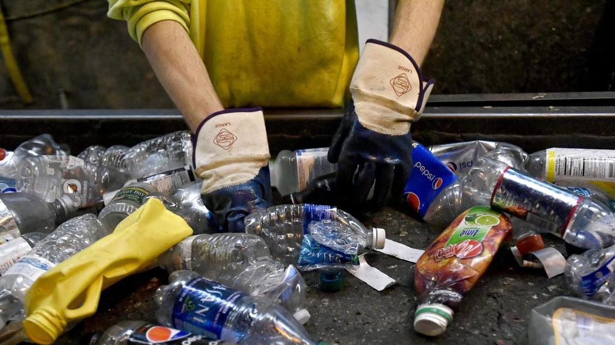 Centre County Recycling and Refuse Authority separate plastic bottles at facility in 2016.