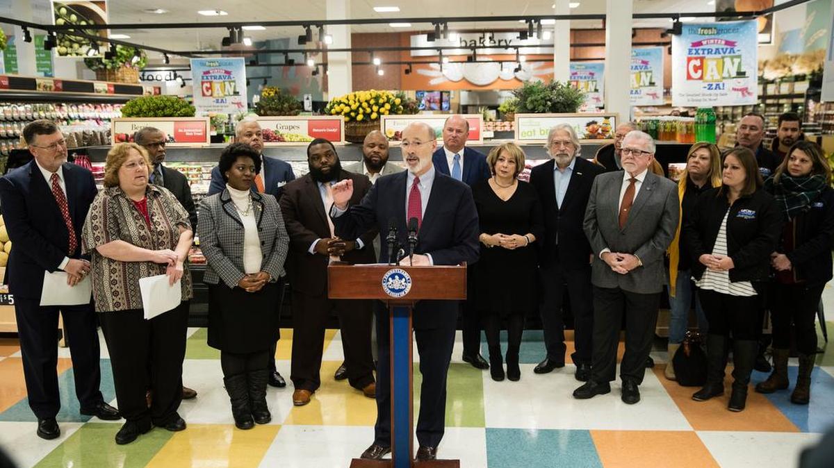 Gov. Tom Wolf speaks at a news conference at The Fresh Grocer in Philadelphia, Wednesday, Jan. 17, 2018. Democratic Gov. Tom Wolf wants to require that employers pay overtime wages to hundreds of thousands of lower-paid Pennsylvanians.