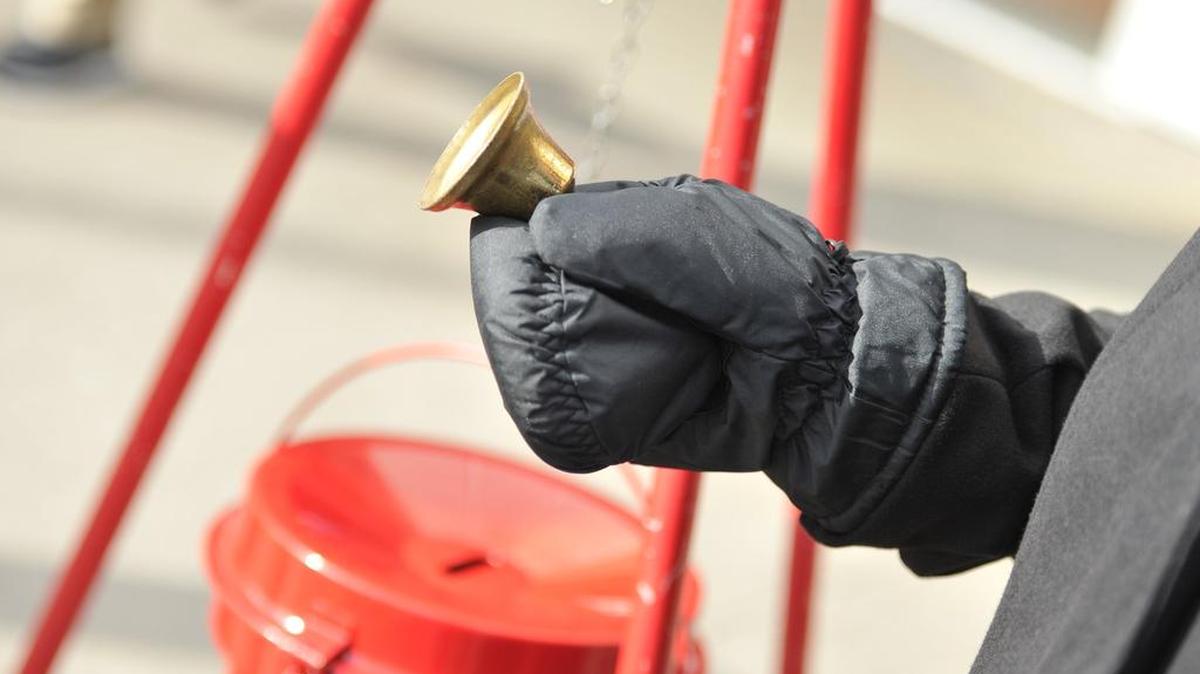Betty Ellen Barrett rings a bell at a Salvation Army kettle outside of Wal-Mart on North Atherton Street on Dec. 3. The Salvation Army is seeking volunteers to help, especially for weekend shifts.