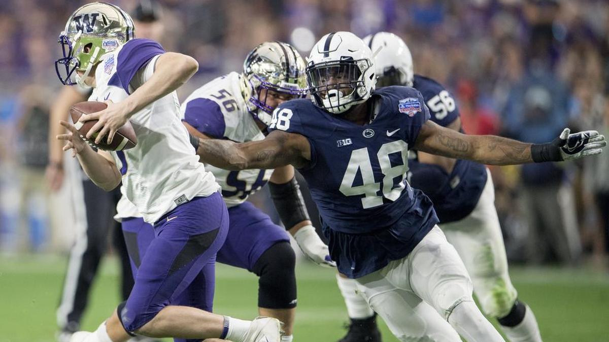 Penn State defensive end Shareef Miller pressures Washington quarterback Jake Browning during the Fiesta Bowl on Dec. 30, 2017, at University of Phoenix Stadium. Miller said earlier this week he's aiming for at least 10 sacks in 2018.