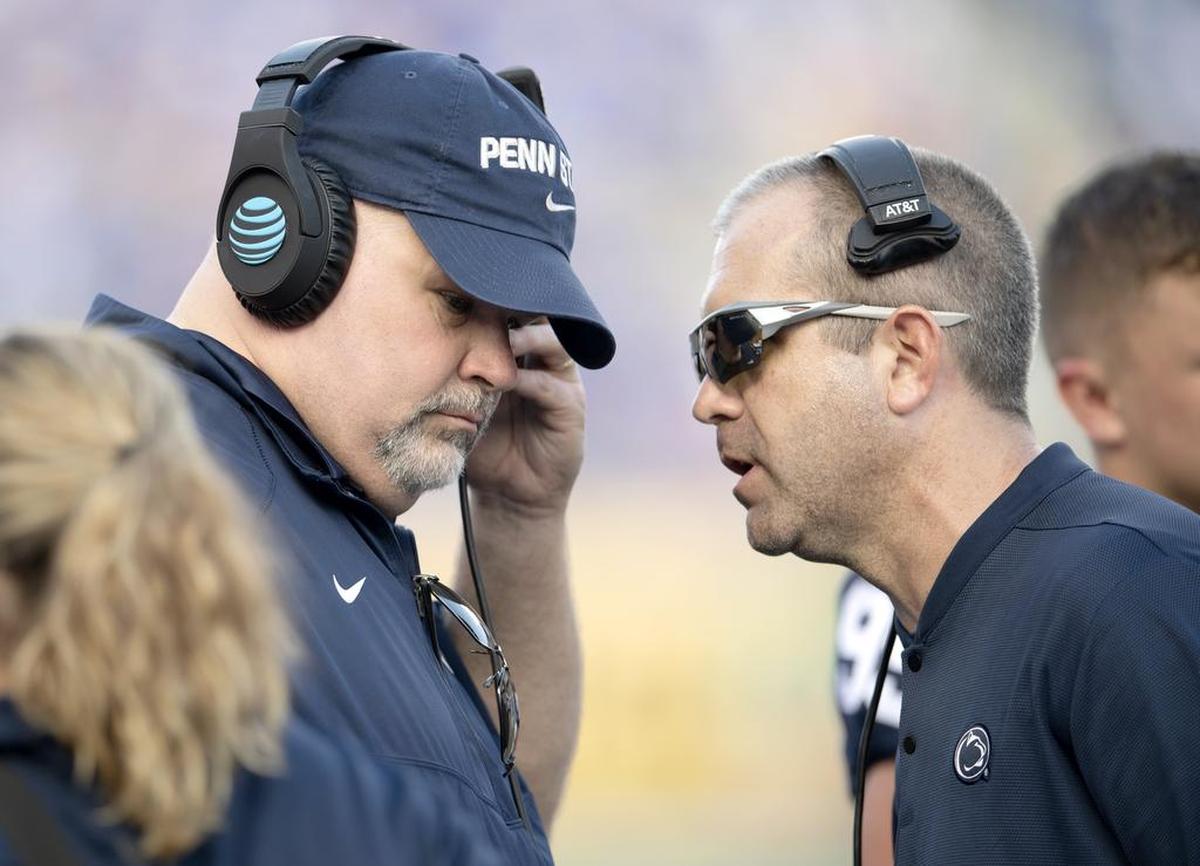 Penn State offensive line coach Matt Limegrover and special teams coordinator Phil Galiano talk during the Citrus bowl against Kentucky on Tuesday, Jan. 1, 2019 at Camping World Stadium.