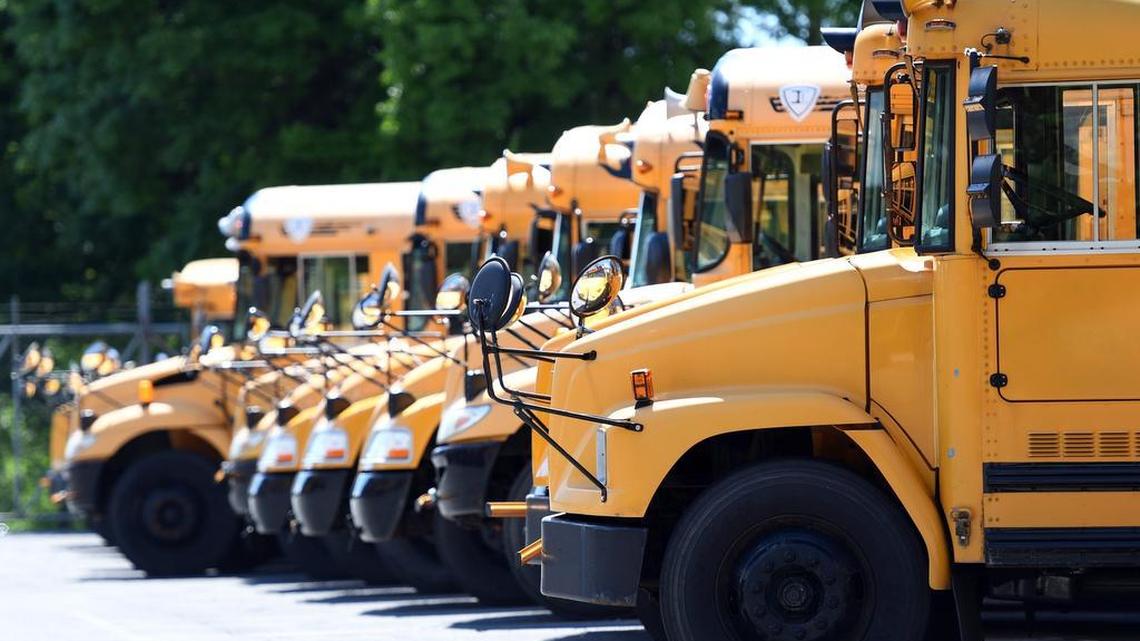 School buses sit in the parking lot of the State College Transportation Department on June, 20, 2017.