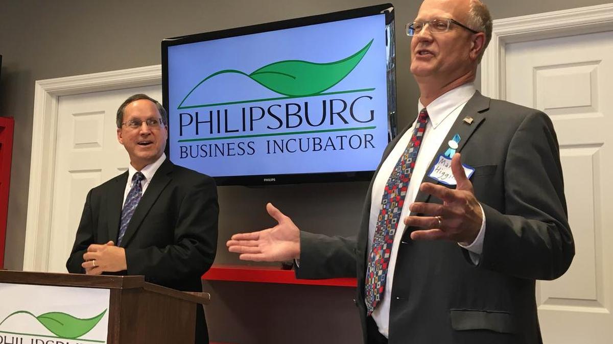 Centre County Board of Commissioners Vice Chairman Mark Higgins (right) speaks at the opening of the Philipsburg Business Incubator in Philipsburg. As the county’s first county-sponsored business incubator, the PBI was opened through the help of Moshannon Valley Economic Development Partnership Executive Director Stan LaFuria.
