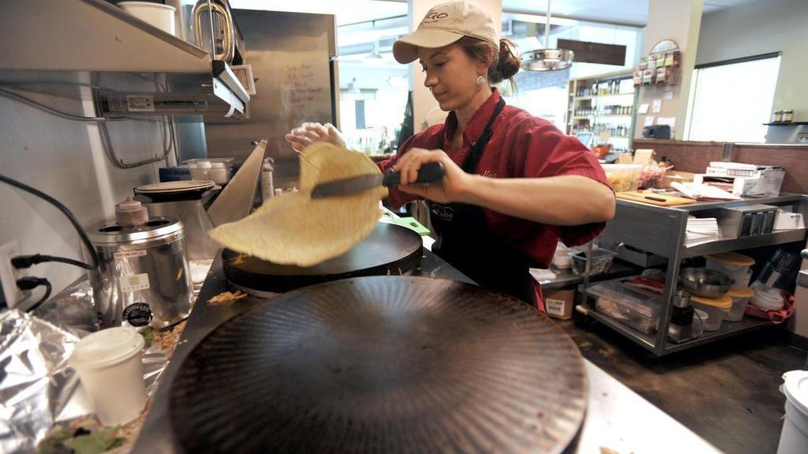 Anne Williams flips a crepe at Callao Cafe on Thursday, May 7, 2015.