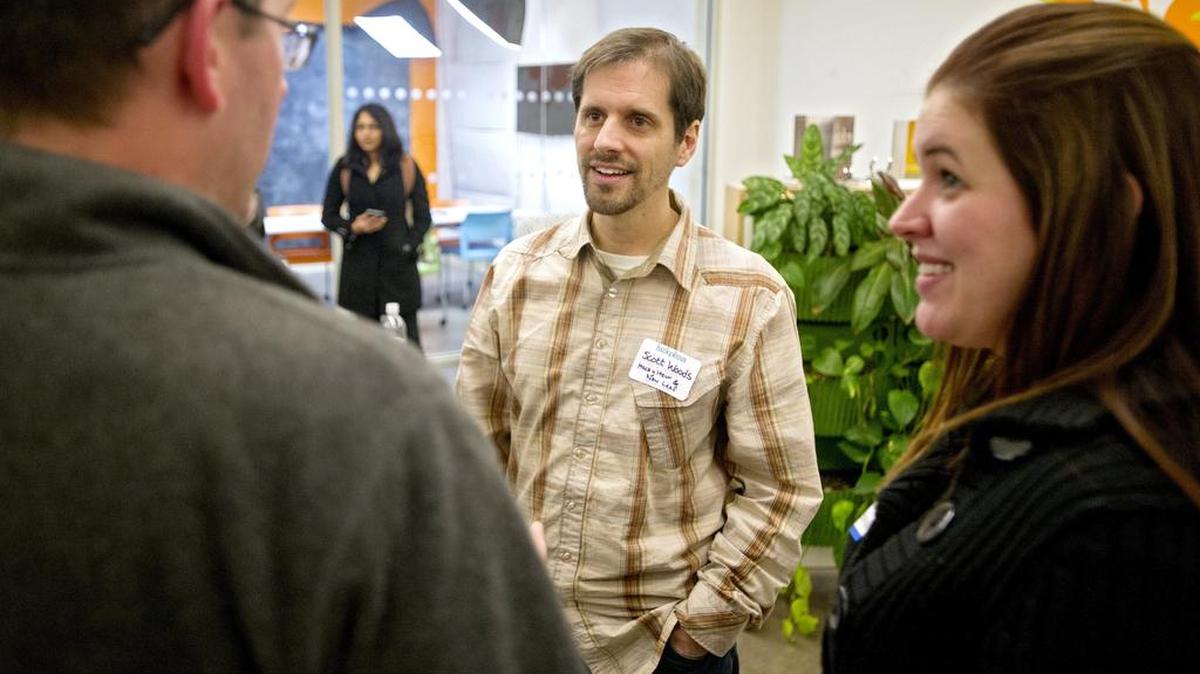 Scott Woods chats during Hacky Hour at New Leaf Initiative on Jan. 14. Every Thursday night from 5:30 to 8 developers of all ages and skills come together to talk about programming and technology.