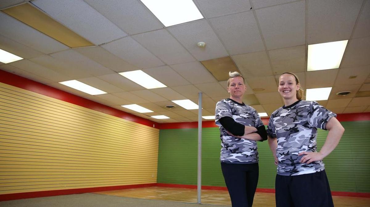 Co-owners Lauryn Weaver, left, and Danielle McHenry pose in the future location of Victory Empower Boot Camp Fitness at 102 E. Bishop St. in Bellefonte.