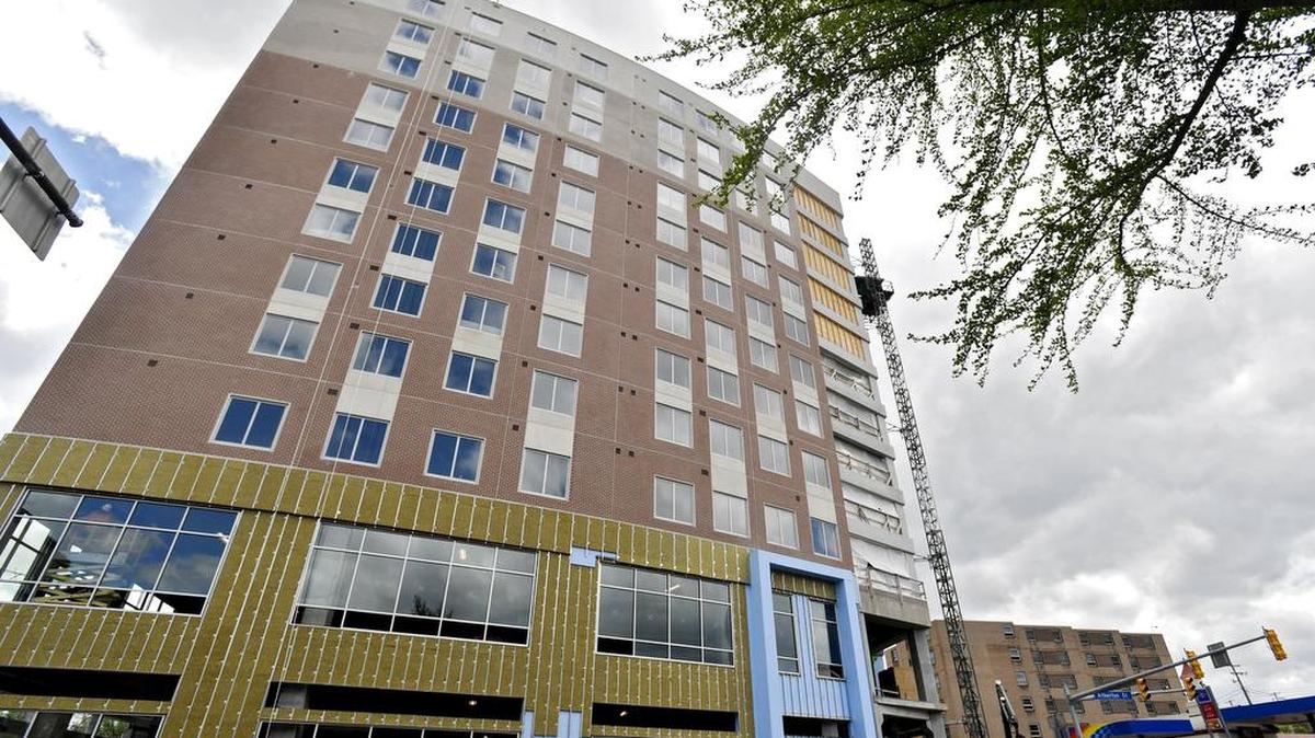 Construction continues Tuesday at the Metropolitan on the corner of Atherton Street and College Avenue in State College. The mixed-use building is set to welcome its first tenants in August.