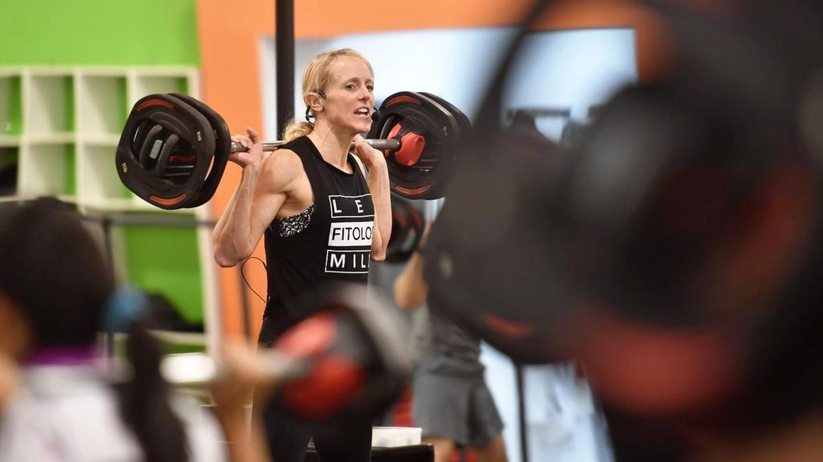 Fitology instructor Jinger Gottschall teaches Bodypump on Tuesday at the State College fitness center.