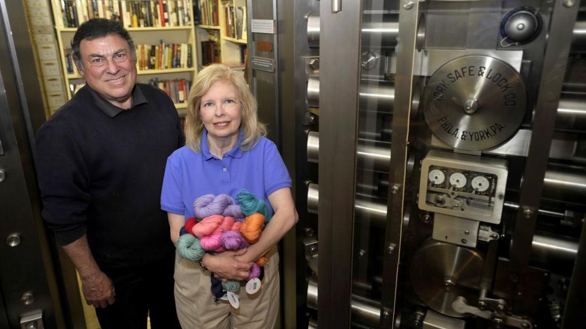 Keith and Kim Bierly stand in the vault of their small business, Forefathers Book Shop, in Rebersburg in April.