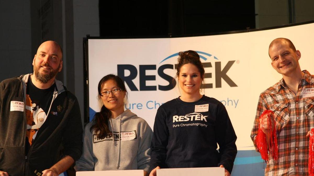 Restek presented an interactive performance to more than 200 middle school students during Park Forest Middle School’s STEM Fair in April. From left are Restek employees Scott Grossman, Fang-Yun Lo, Samantha Harter and Titus Morehead.