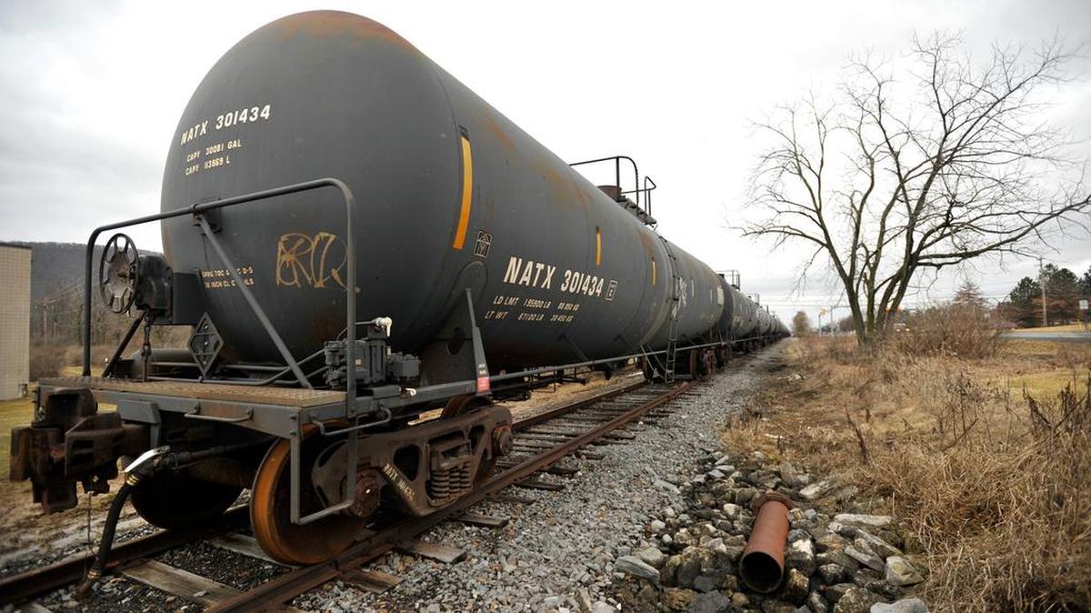 A long line of rail cars sits along College Ave. in State College Feb. 25.