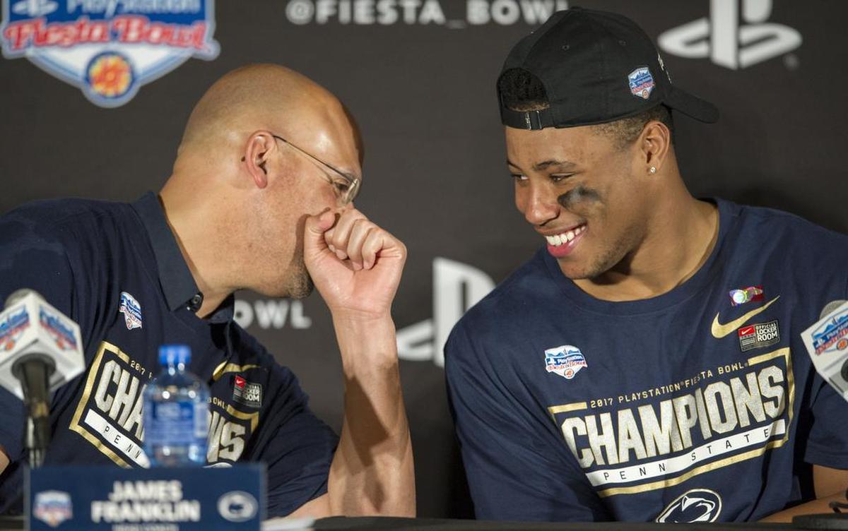 Penn State football coach James Franklin and running back Saquon Barkley joke in the press conference after winning the 2017 Fiesta Bowl on Saturday, December 30, 2017 at University of Phoenix Stadium. The Nittany Lions won, 35-28.