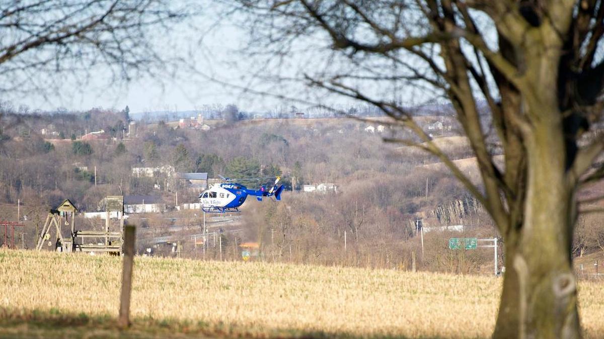 A medical helicopter arrives on the scene of a crash on Sunday in Spring Township.