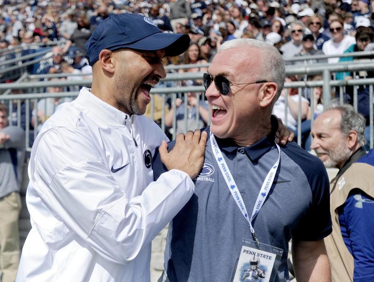 Comedian Keegan-Michael Key jokes with former Penn State men’s basketball coach Patrick Chambers during the Penn State Blue-White Game on Saturday, April 21, 2018.