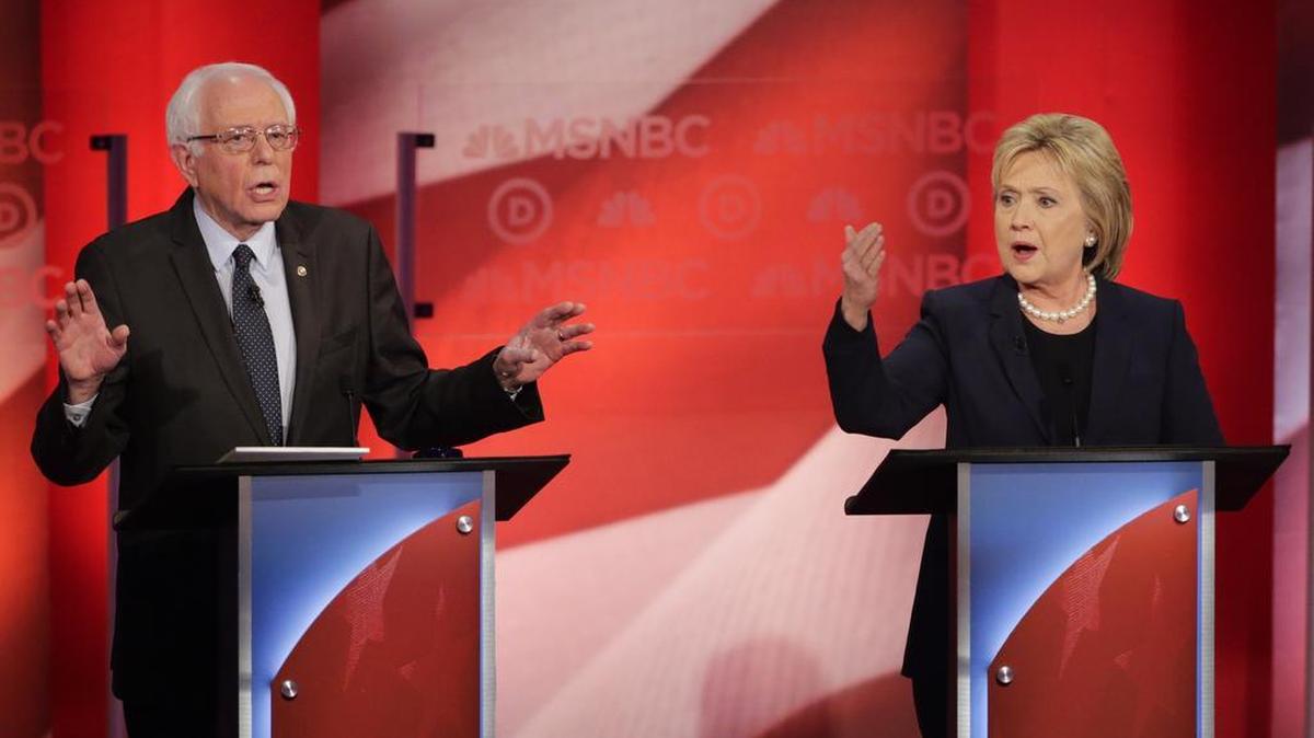 Democratic presidential candidate, Sen. Bernie Sanders, I-Vt, and Democratic presidential candidate, Hillary Clinton spar during a Democratic presidential primary debate in February. Sanders and Clinton will open offices in State College soon.