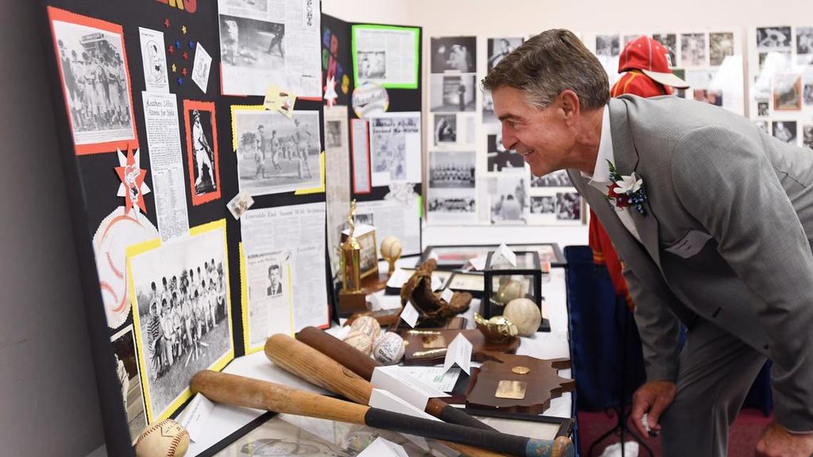 Centre County Sports Hall of Fame inductee Bruce Parkhill takes a look at Denny Leathers’ table of memorabilia during the Centre County Hall of Fame Banquet Sunday, Oct. 15, 2017, at the State College Ramada.