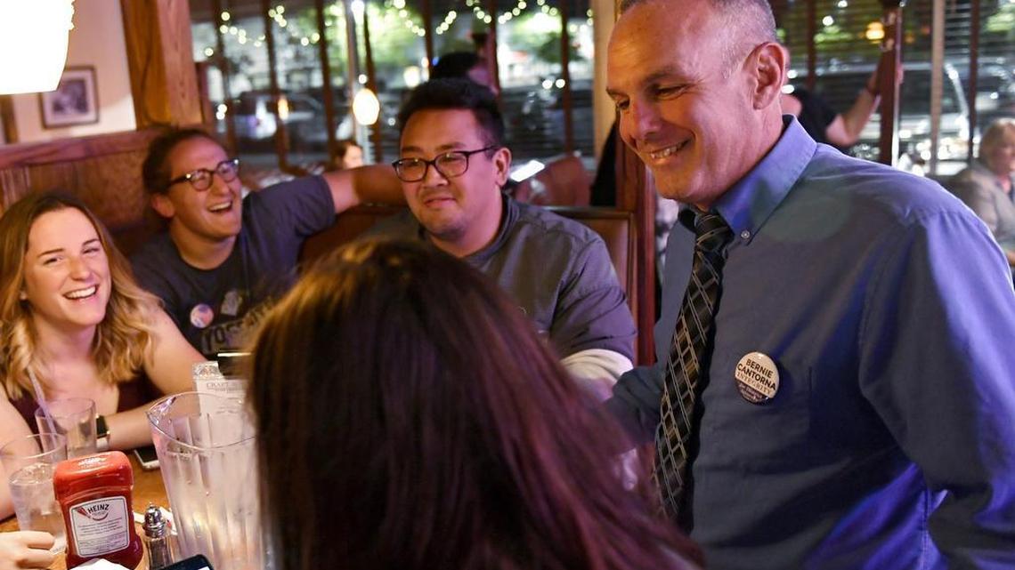 District Attorney candidate Bernie Cantorna talks to supporters as the totals from the voting precincts rolled in on Tuesday. Cantorna beat incumbent Stacy Parks Miller for the Democratic nomination.
