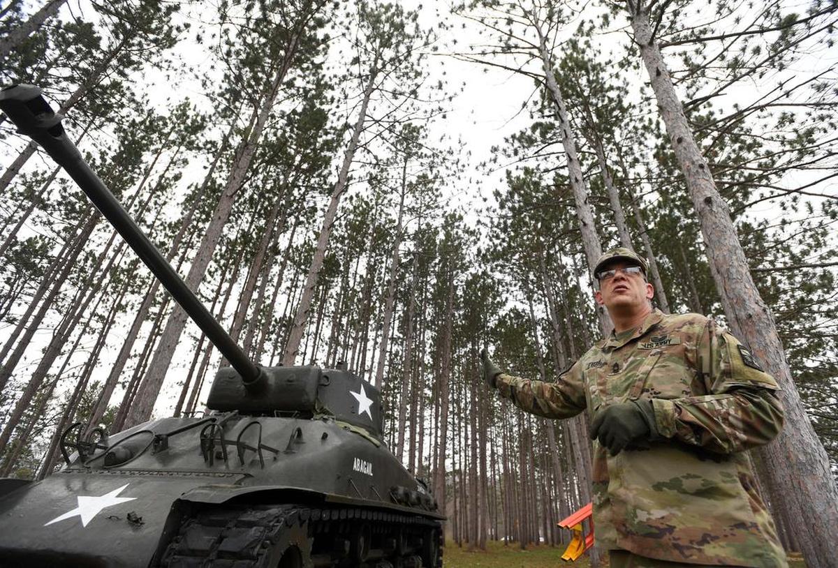 Master Sgt. Branden Syverson talks about the M4A1(76)W General Sherman tank during a past Exploring the Armor tour at the Pennsylvania Military Museum.