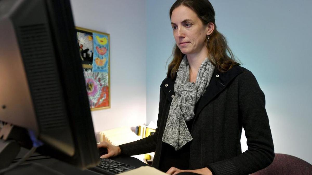 Evangeline Wright, staff attorney at MidPenn Legal Services, works in her office on East College Avenue on Tuesday. The nonprofit, public-interest law firm receives funding from the Legal Services Corporation, which President Donald Trump’s proposed budget threatens to eliminate.