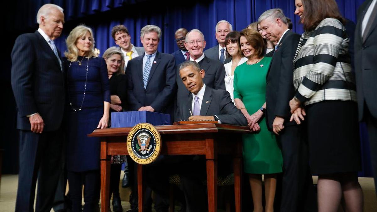 President Barack Obama signs the 21st Century Cures Act on Dec. 13 at the White House.