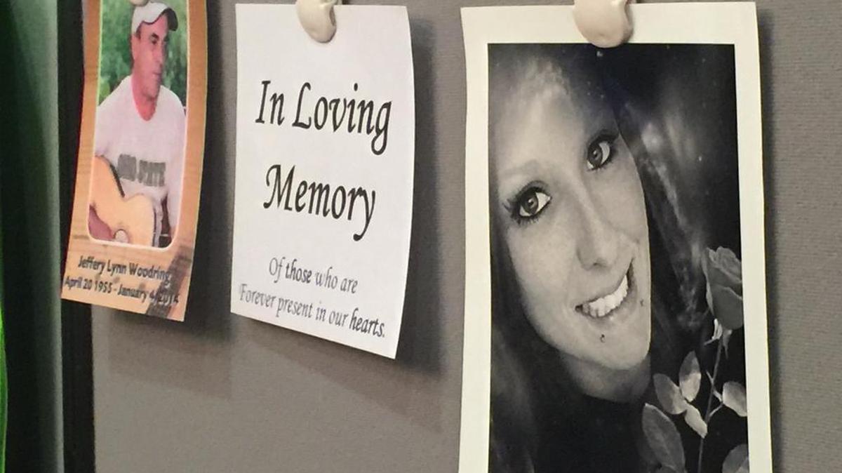 Family members displayed pictures of lost loved ones Saturday at the Centre County HOPE Initiative vigil at the courthouse annex.