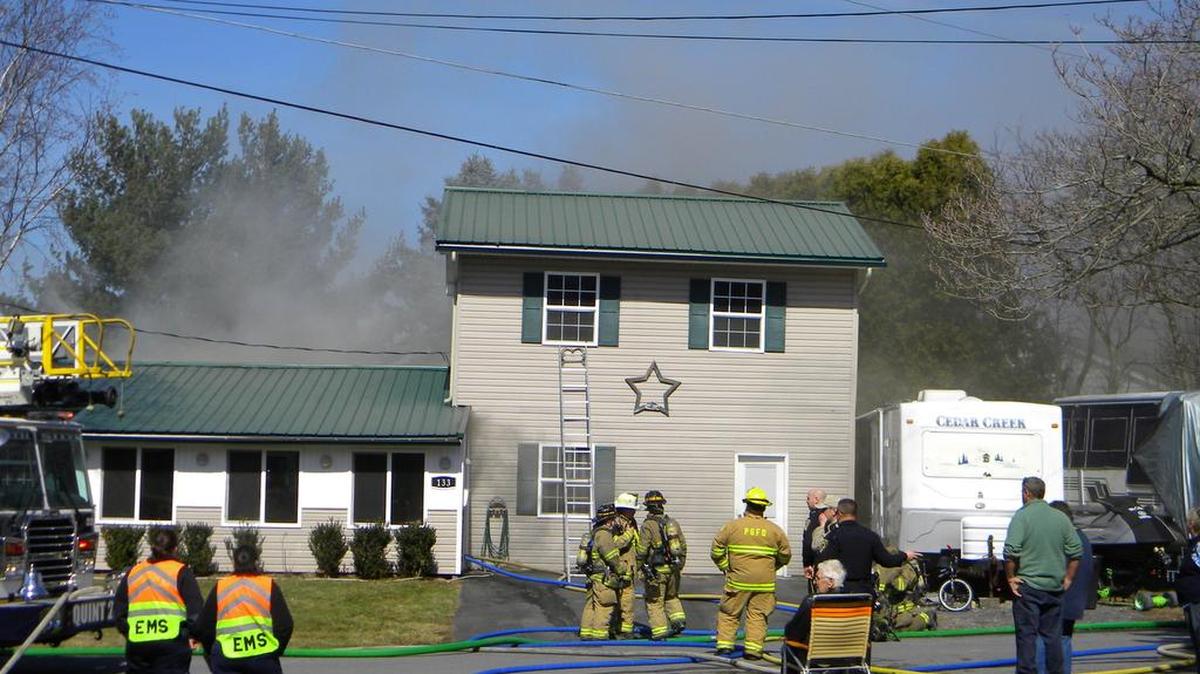 Fire companies responded to a fire at 133 Whitman Circle Monday. The house was empty, but crews were forced to expose the attic area and interior walls to finally extinguish the blaze.