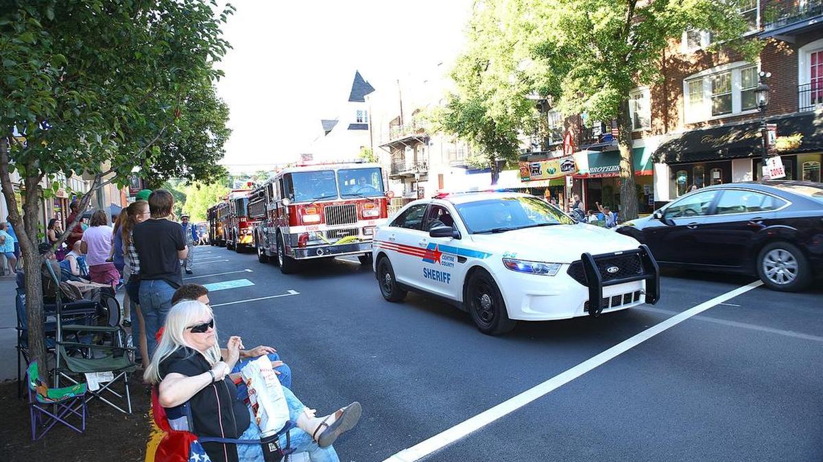 Police cars, firetrucks and ambulances lead the 28th annual Bellefonte Cruise on Friday night. The event features hundreds of classic and new cars, bands, food vendors and events for children.