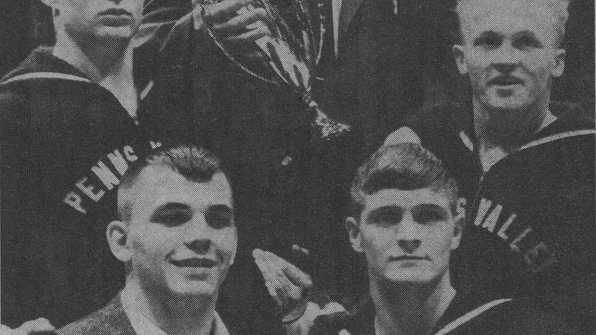Pictured after winning the district title are Penns Valley wrestlers: bottom row, Barry Williams and Marty Ilgen; back, Jack Reigel, coach Joe Hammaker and Sam Reish.