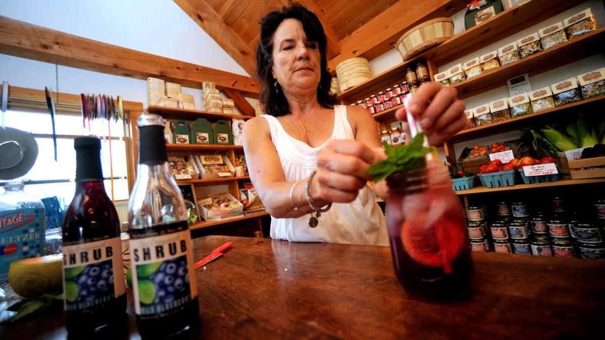 Kim Tait of Tait Farm Foods in Boalsburg makes a wild blueberry shrub in 2015.