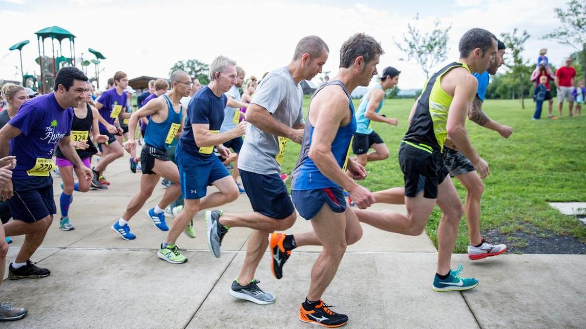 Runners, joggers and walkers join the fifth annual Flutopia 5K in Tom Tudek Memorial Park on Saturday in Ferguson Township. The race benefits Centre Volunteers in Medicine and Doctors Without Borders.