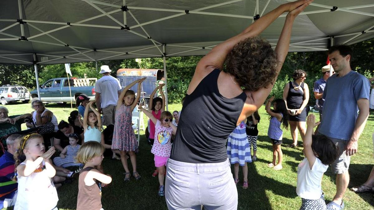 Heather House leads a session of Yoga for Kids during Crickfest Sunday in Coburn.