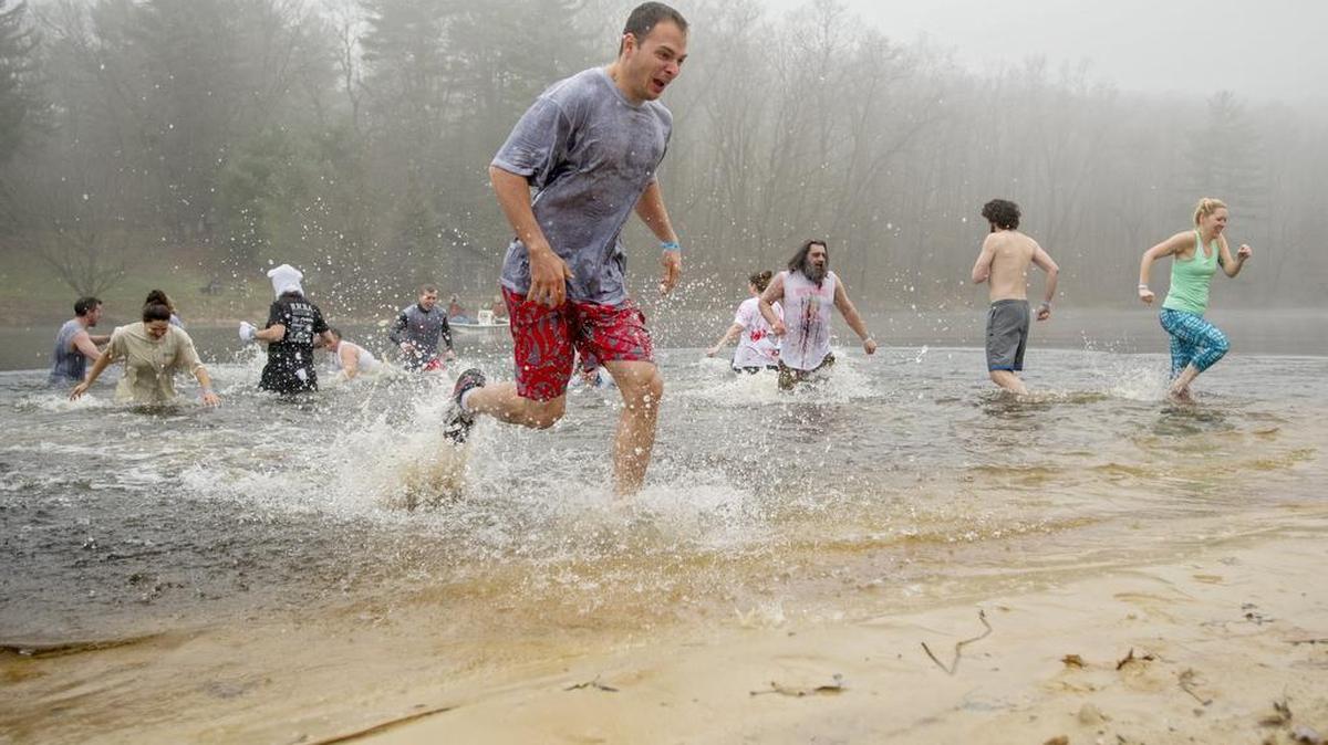 The super plungers ran in and out of the 40 degree water at Black Moshannon State Park three times for the YMCA Centre County Annual Polar Bear Plunge on Saturday, December 5, 2015.