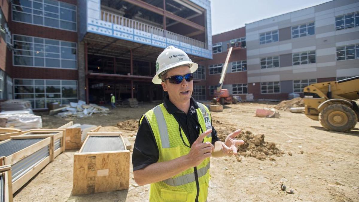 Project manager Tim Jones talks about the new main entrance during a tour of the construction at State College Area High School on Thursday.