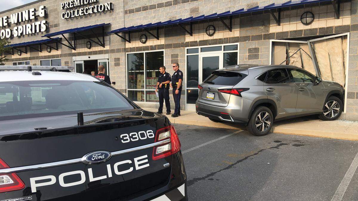 An SUV crashed into the Fine Wines and Good Spirits store in the Southridge Plaza off South Atherton Street on Friday evening. No injuries were reported.