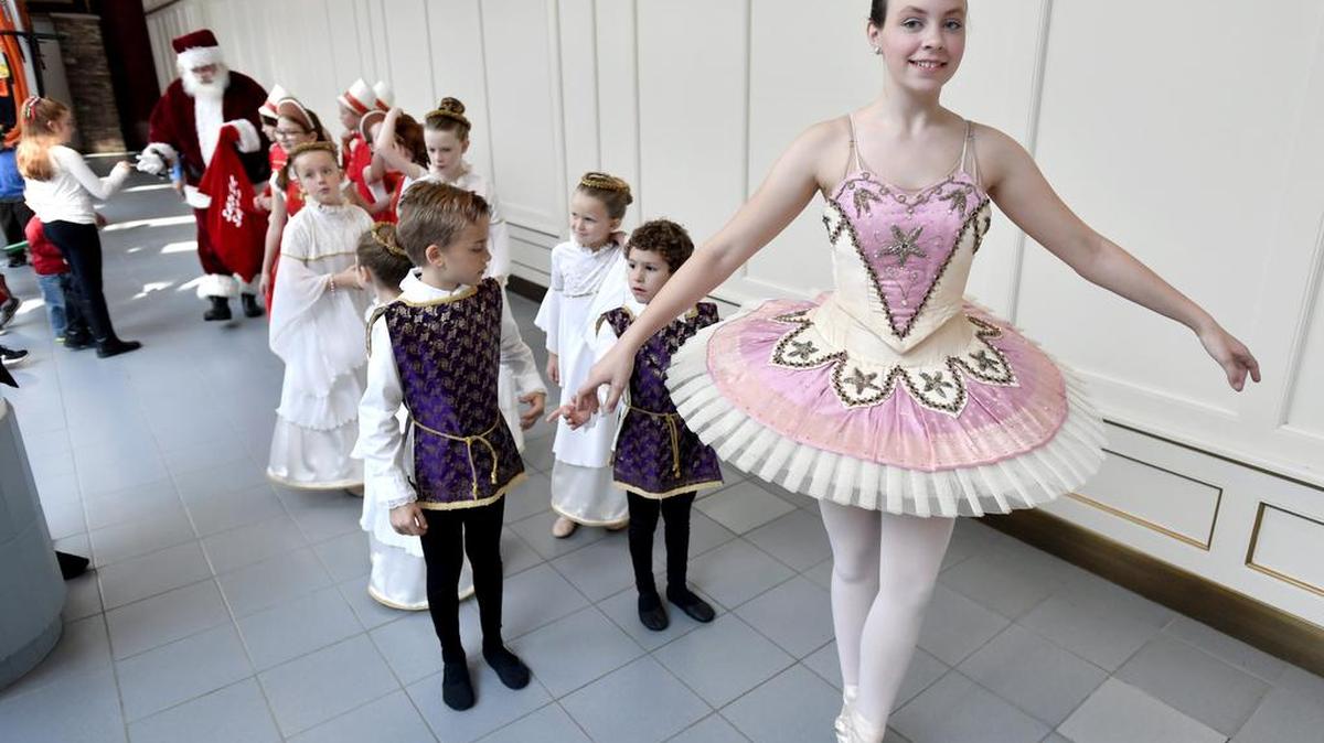 Sugar Plum Fairy Mary Rose Valentine leads a procession of dancers from “The Nutcracker” to introduce Santa on Saturday at the Candy Cane Carnival at the Nittany Mall. The young dancers are from the Performing Arts School of Central Pennsylvania.