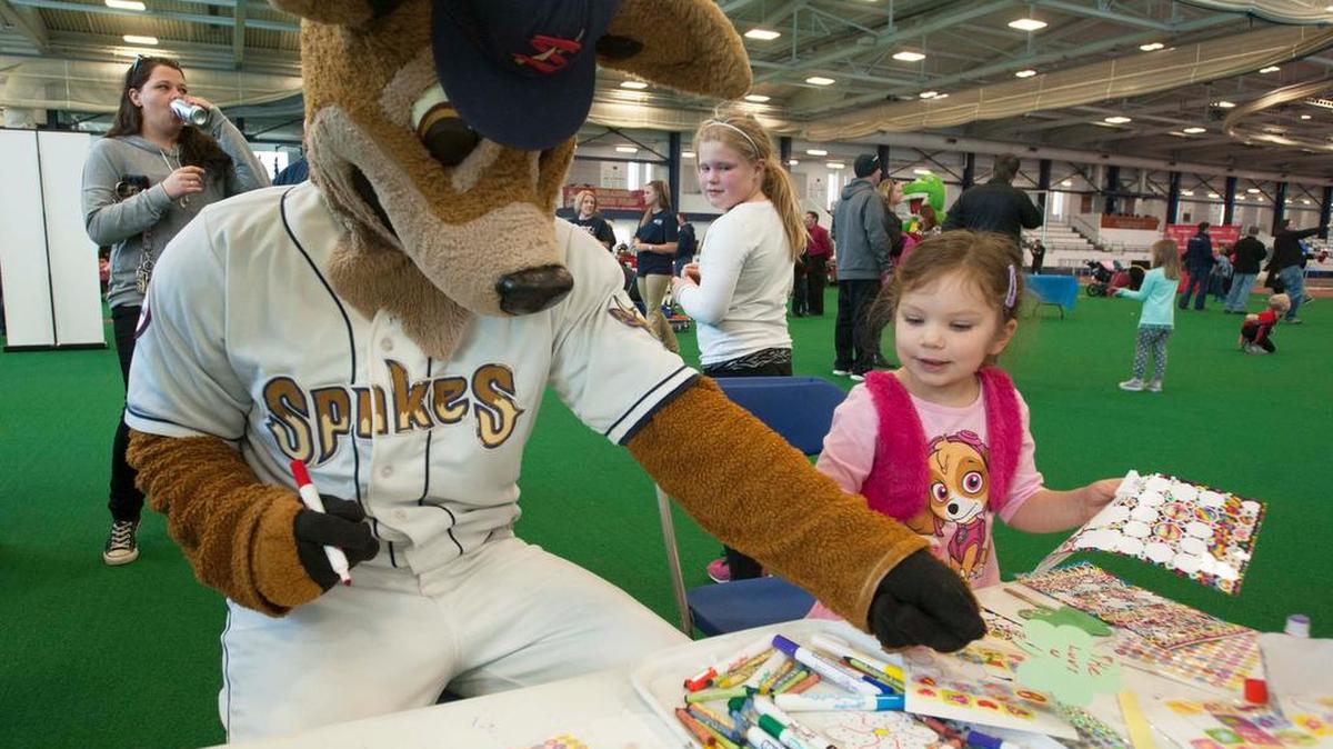 Ike the Spike and Sophia Rearick, 4, do arts and crafts during Spikes Fest on Sunday at Penn State’s Indoor Multi-Sport Facility.