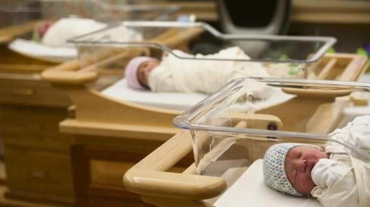 A line of the “leapling” Leap Year babies born Monday at Magee-Womens Hospital of UPMC in Pitsburgh sleep through their first birthday party in the hospital nursery.