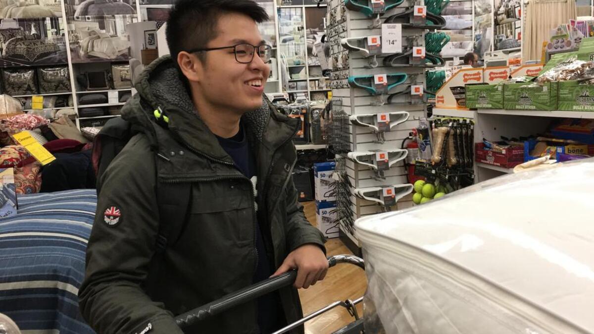 Han Ho Bae, 19, shops at Bed Bath & Beyond in State College on Friday, Jan. 7. Bae is one of about 200 international students who started at Penn State in the spring 2017 semester, and as part of a program with Bed, Bath and Beyond, they shopped for dorm supplies that they couldn’t bring with them on the plane.