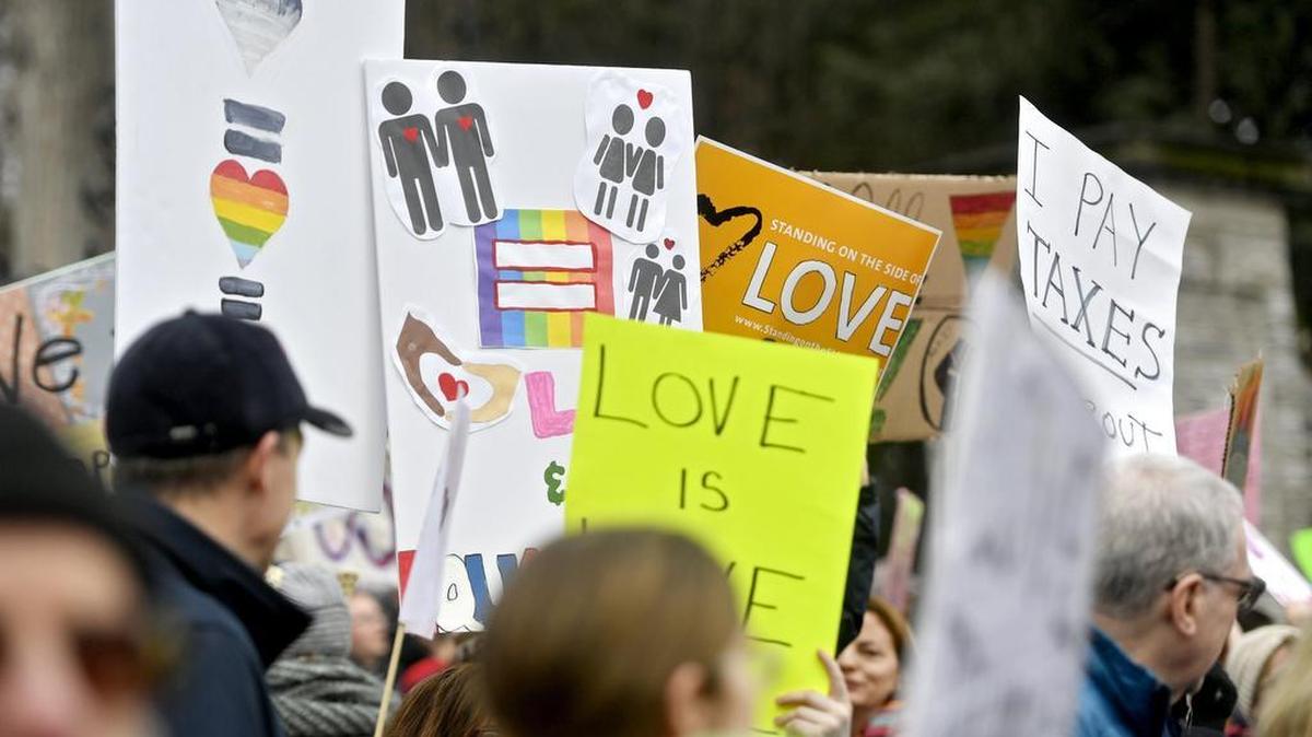 Centre County residents participated in a women's solidarity march at the Allen Street gates on Jan. 21, 2017.