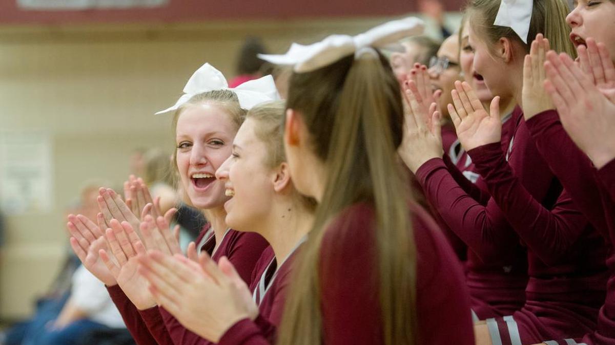 The State College cheerleaders at the girls’ basketball game on Thursday.