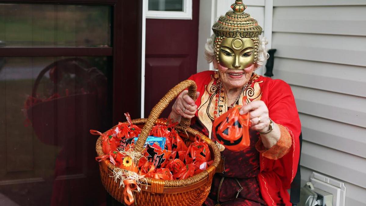 Ninety-three-year-old Thelma Andrews always greets her State College neighborhood trick-or-treaters in costume.