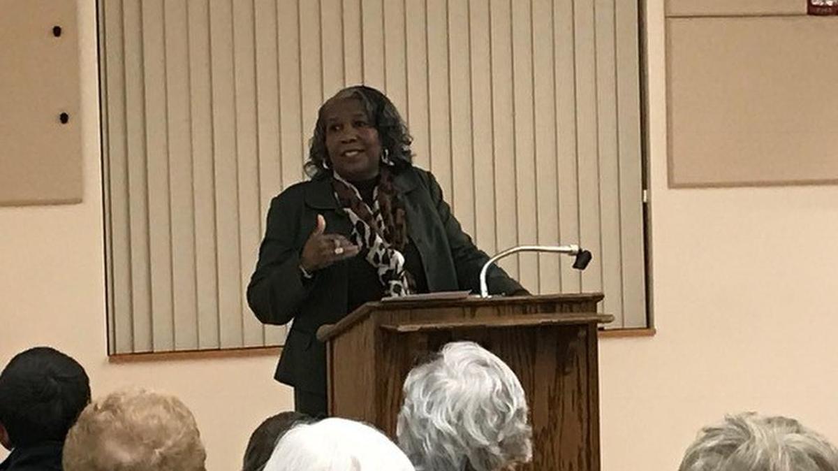 Barbara Farmer, director of the Office of Multicultural Affairs for Penn State’s College of Information Sciences and Technology, speaks at the CommUNITY event held Saturday night at the State College Municipal Building.