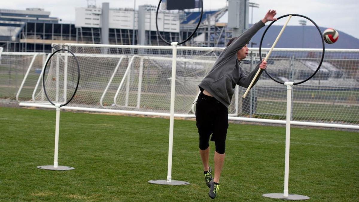 Penn State junior Joey Leone attempts to block the ball during a quidditch lesson to benefit Thon on Sunday at the Intramural Fields.