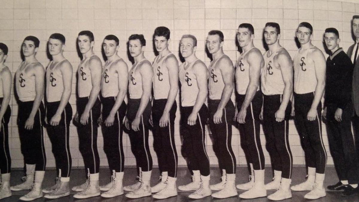 Pictured is the 1962 undefeated State High wrestling team.
