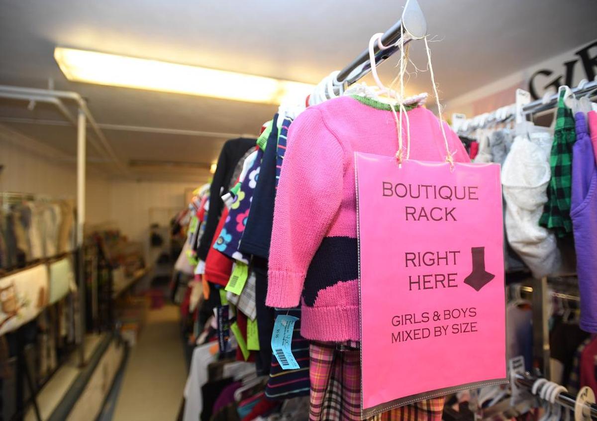 Racks of children’s clothes and accessories are pictured at the Mommy Shoppe in this file photo.