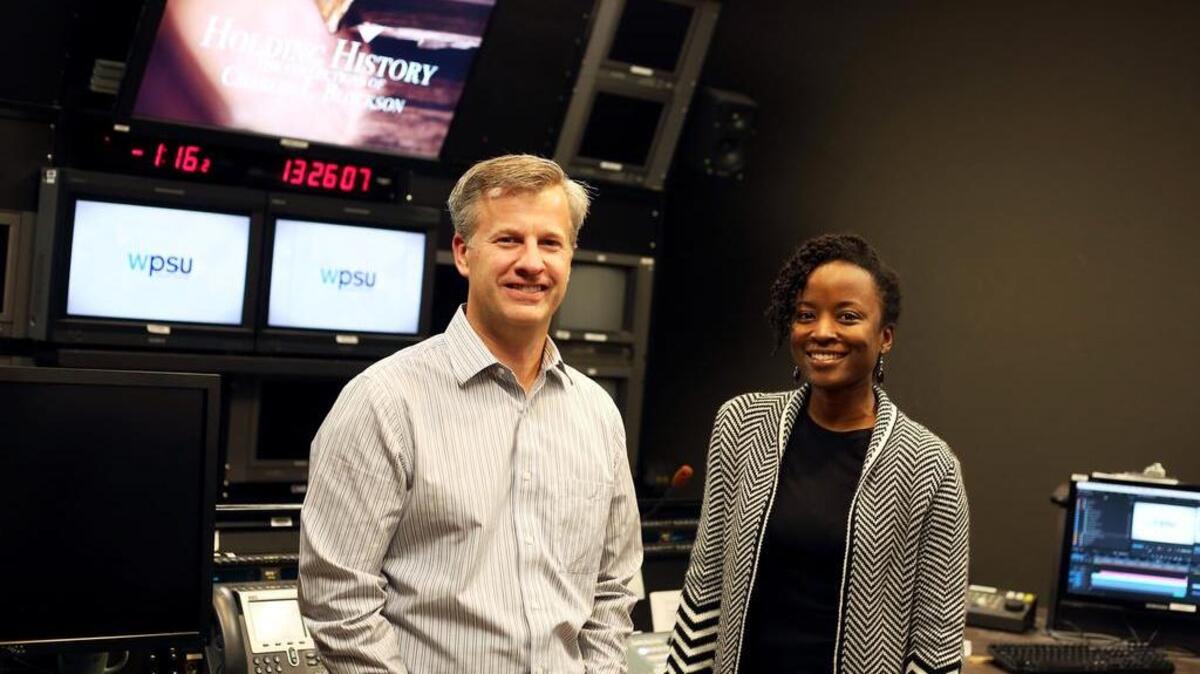 WPSU production “Holding History: The Collections of Charles L. Blockson,” written, directed and produced by Cole Cullen, left, and Cheraine Stanford, was presented with a Mid-Atlantic Emmy on Sept. 24 in Philadelphia.