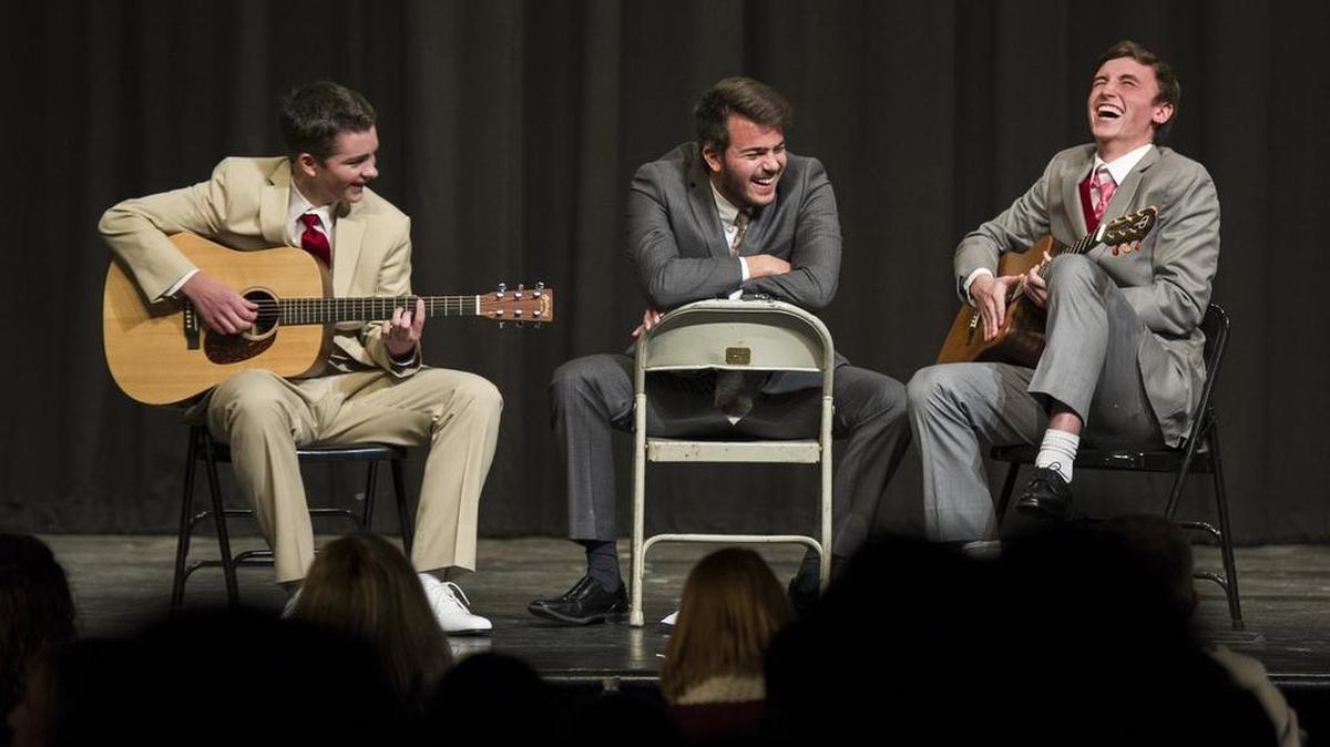 From left, Keagan Rallis, Mike Riley and Brennan Cornwall laugh while performing a Justin Bieber song together during the talent portion of the Mr. State High competition on Sunday. Money raised at the event went to the Muscular Dystrophy Association.