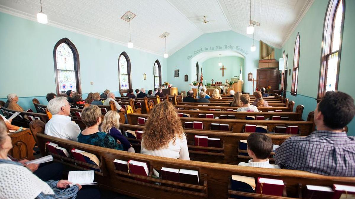 The congregation listens as Pastor Susan Williamson preaches Sunday at Gatesburg Lutheran Church. The church was celebrating its 200th congregational anniversary.